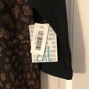 LuLaRoe Tops - 2x Animal print Randy. NWT LuLaRoe Tops - 2x Animal print Randy. NWT